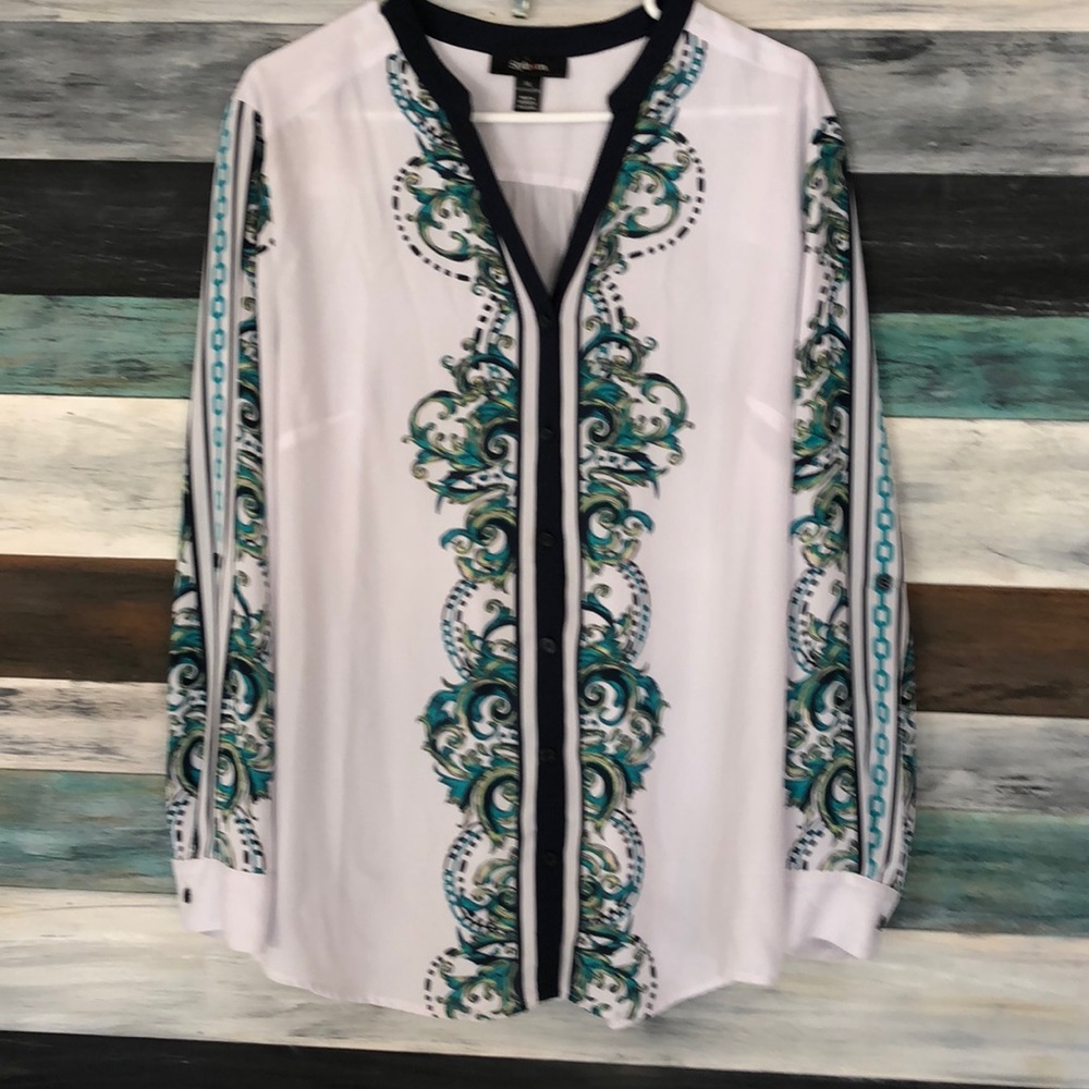Long sleeve v-neck blouse.